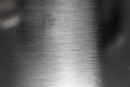 Scratched metal surface for background textureの写真素材