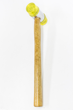 Plastic hammer on white background