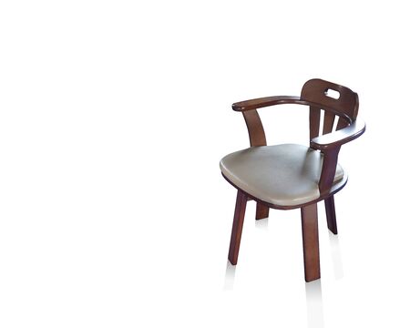 Wooden chair with backrest, white leather upholstery on white background, object, copy spaceの写真素材