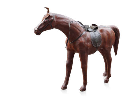 beautiful old brown wooden horse stand on white background, copy spaceの写真素材