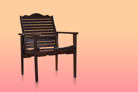 old wooden chair on gradient orange and pink background, vintage, object, furniture, comfortable, retro, copy spaceの写真素材