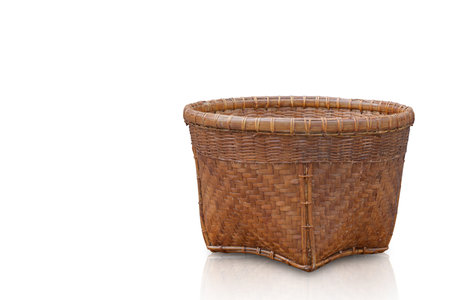 antique and old weave basket made of bamboo on white background, object, decor, vintage, copy spaceの写真素材