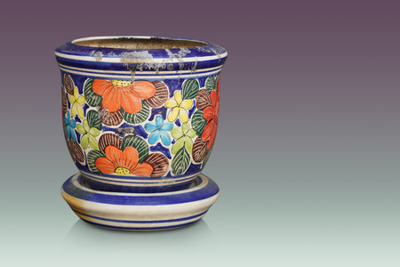 old blue and white ceramic pot on ceramic saucer, on gradient purple and green background, object, vintage, retro, ancient, spaceの写真素材