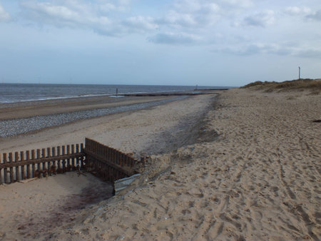 Norfolk sandy seaside groyne and beach for a holidayの写真素材