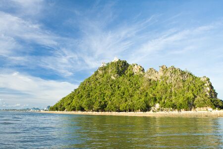 Beach with mountain backdrop Prachuap Khiri Khan city,THAILANDの写真素材