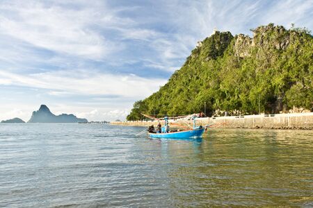 Beach with mountain backdrop Prachuap Khiri Khan city,THAILANDの写真素材