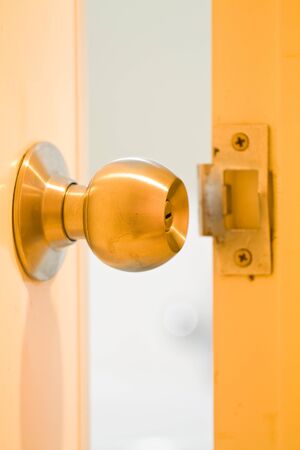 A doorknob is opened の写真素材