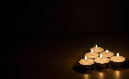 Candle light in the darkの写真素材