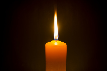 Candle light in the darkの写真素材