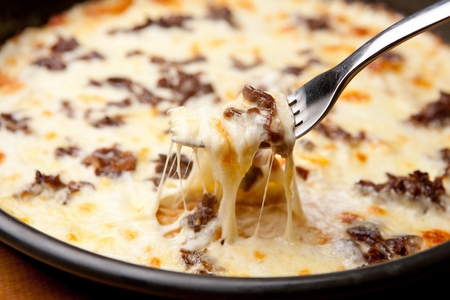 Pizza to eat with a spoonの写真素材