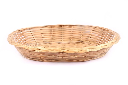 Empty wicker basket isolated on whiteの写真素材