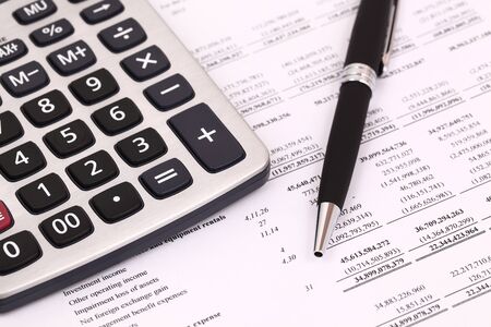 calculator and stationery items on the table