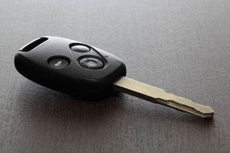 car key on the wooden backgroundの写真素材