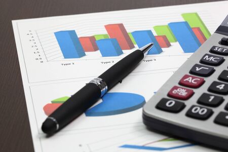 Business of financial analytics on wood tableの写真素材