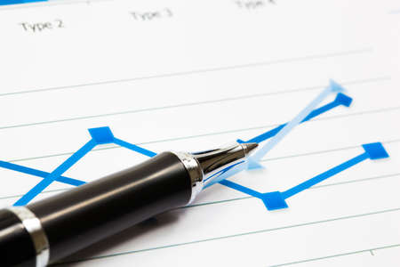 Financial paper charts and graphsの写真素材