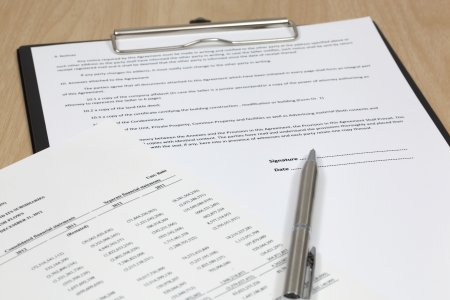 Close up of signing a contractの写真素材