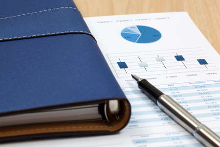 Financial paper charts and graphsの写真素材