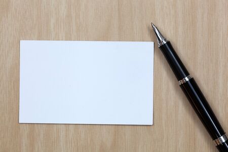 business card on table with penの写真素材