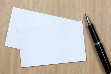 business card on table with penの写真素材