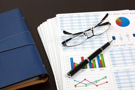 Graphs and Charts Report with penの写真素材