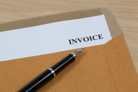 invoice, estimates and statements in folderの写真素材