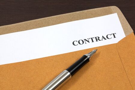 contract, contract in folder Close-upの写真素材