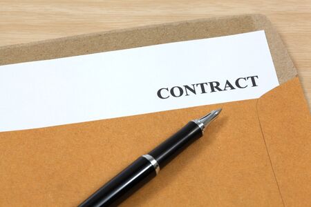 contract, contract in folder Close-upの写真素材