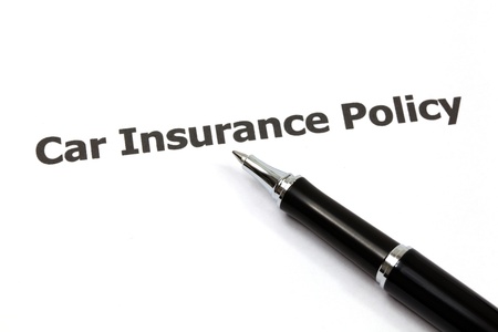 Car key on an insurance policyの写真素材