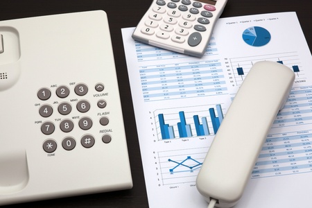 business report with telephone on a tableの写真素材