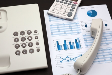 business report with telephone on a tableの写真素材