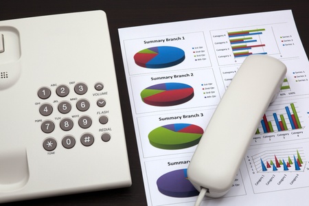 business report with telephone on a tableの写真素材