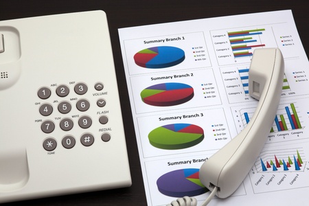 business report with telephone on a tableの写真素材