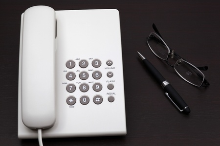 telephone white on a tableの写真素材