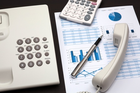 business report with telephone on a tableの写真素材