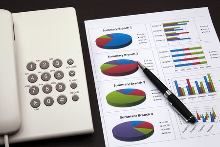business report with telephone on a tableの写真素材