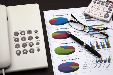 business report with telephone on a tableの写真素材