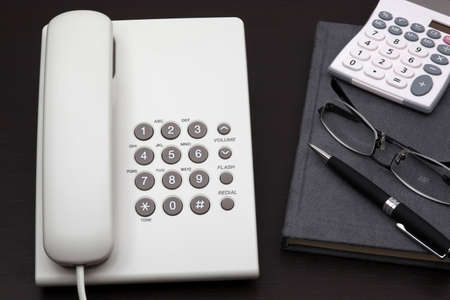 telephone white on a tableの写真素材