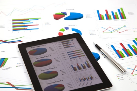 business workplace with stock market dataの写真素材