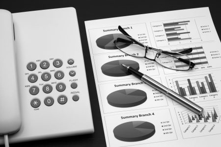 business report with telephone on a tableの写真素材