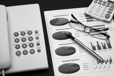 business report with telephone on a tableの写真素材