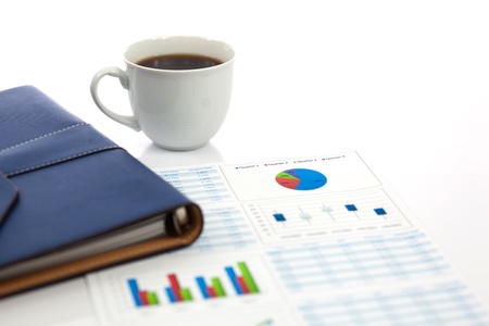 Business report with cup of coffeeの写真素材