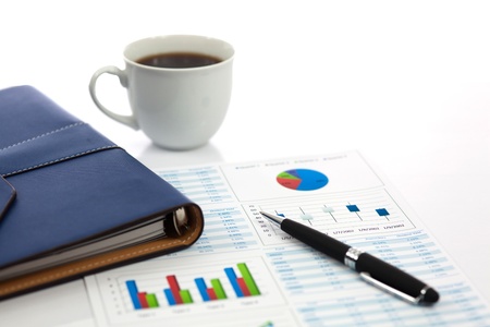 Business report with cup of coffeeの写真素材