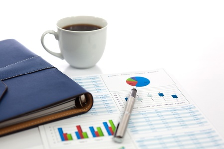 Business report with cup of coffeeの写真素材
