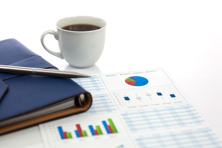 Business report with cup of coffeeの写真素材