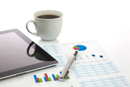 Business report with cup of coffeeの写真素材