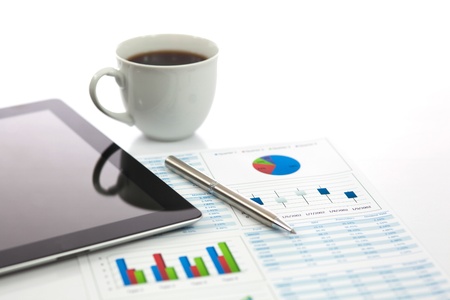 Business report with cup of coffeeの写真素材