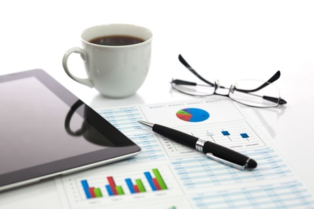 Business report with cup of coffeeの写真素材