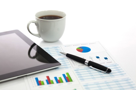 Business report with cup of coffeeの写真素材