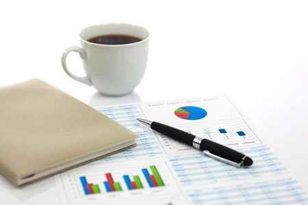 Business report with cup of coffeeの写真素材