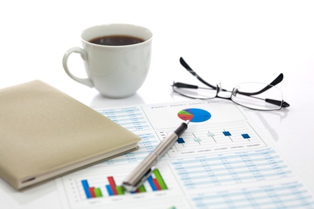 Business report with cup of coffeeの写真素材